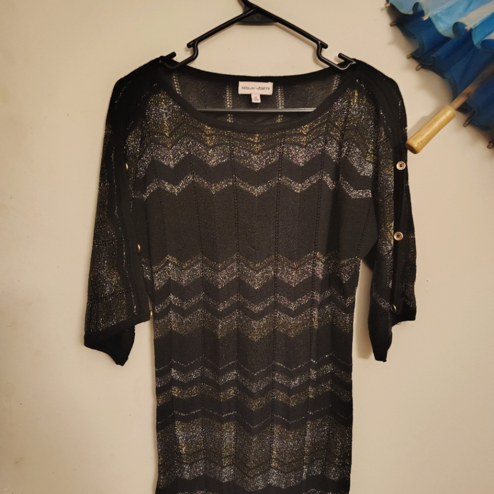 Black sweater with gold and silver zigzag threaded